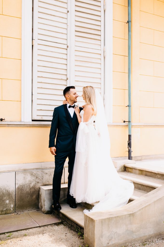 a man and woman in wedding attire